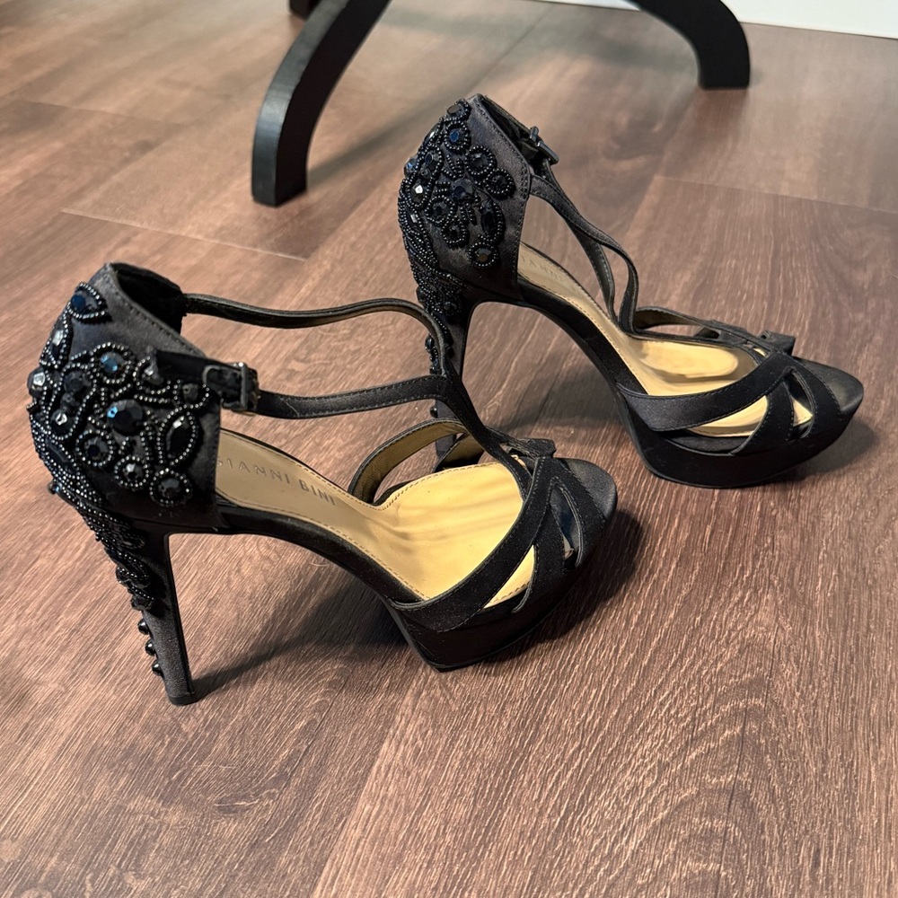GIANNI BINI heels Size 7 M
With 5” tall heels 1” platform Black with jewel.